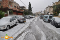  صور من الأرشيف - تساقط الثلوج على مدينة اللد في عام 2013 